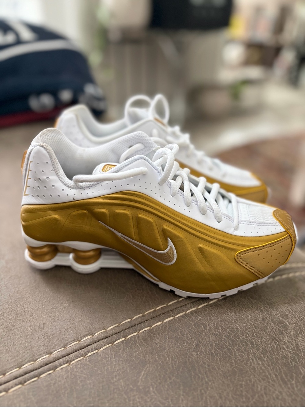 Nike Shox R4 White & Gold Athletic Sneakers